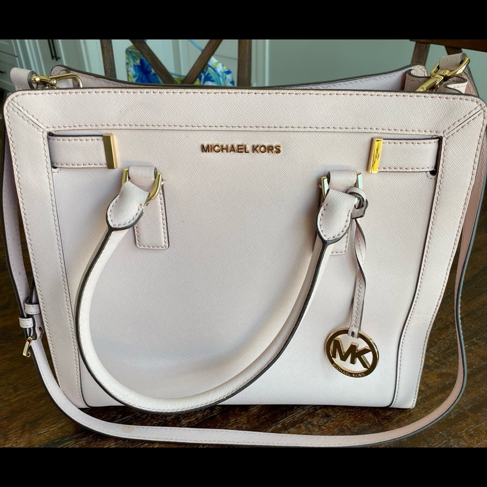 Pink Michael Kors purse. It’s in excellent condition.